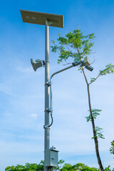 Security camera in the park powered by solar energy,Security of solar power plant.cctv cameras secure solar.