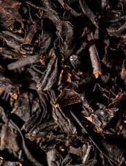 Close up of granules of black tea as a background.