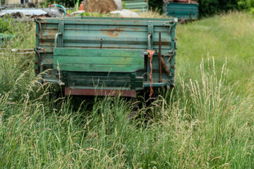 a car trailer in the grass