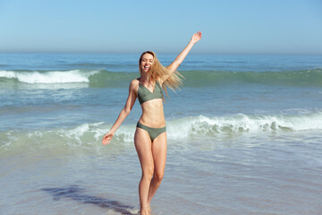 Beautiful woman enjoying on the beach