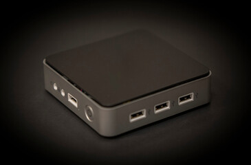 a mini PC with black background