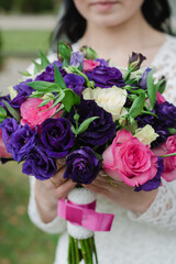 bridal bouquet of roses, bride holding bouquet