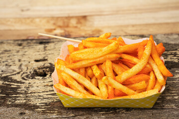 French fries topped with sliced paprika
