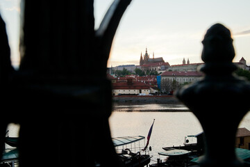 Fototapeta na wymiar Distant framed view of Prague castle and river Vltava
