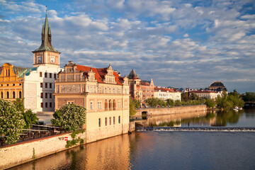 Fototapeta na wymiar View of the Old town river bank of Vltava from Charles bridge before sunset