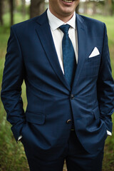 groom in a blue suit, man in a jacket, groom's fees