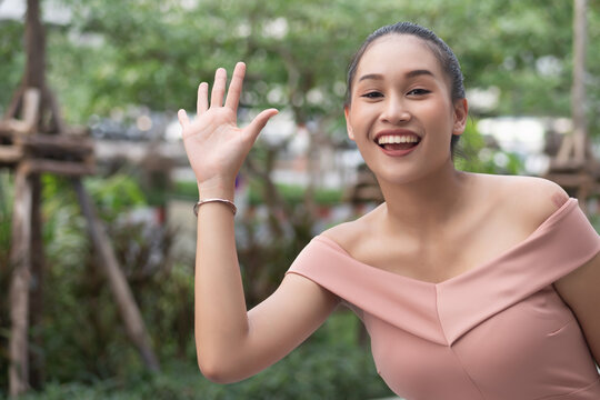 Happy Friendly Woman Saying Hi, Hello To You