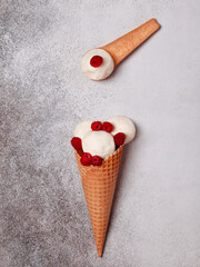 Edible spoons. Raspberry ice cream. Sweet spoons with ice cream.
