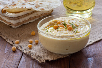 Chickpea hummus on a wooden table