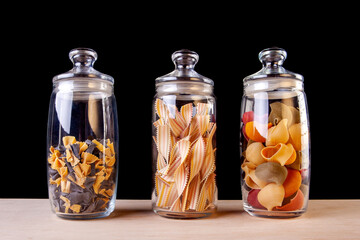 pasta in a glass bowl on a table in the studio