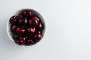 Close-up of a cherry tree on a wooden Board. Fresh berries