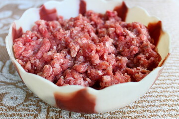 Fototapeta na wymiar Raw minced meat in a bowl