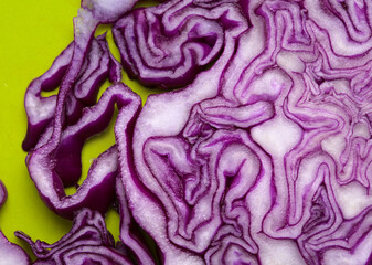 Fototapeta premium Red Cabbage cut, with inner patterns of folded leaves visible