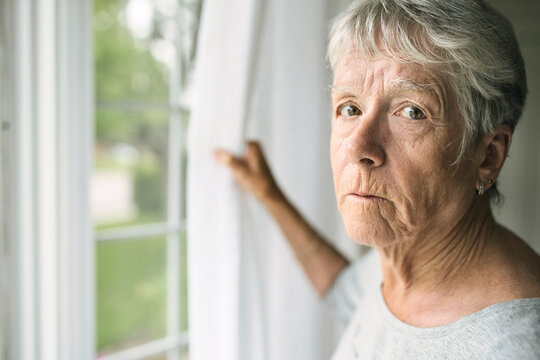 A Worried Senior Woman At Home Felling Very Bad