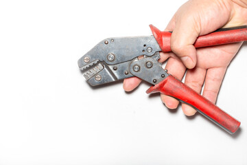 hand holding pliers