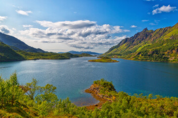 Naklejka na ściany i meble Beautiful summer Norwegian landscape with a lake and mountains
