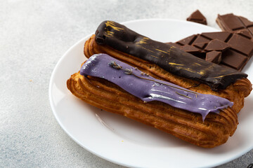 Close up photo of fresh french eclair cake with icing