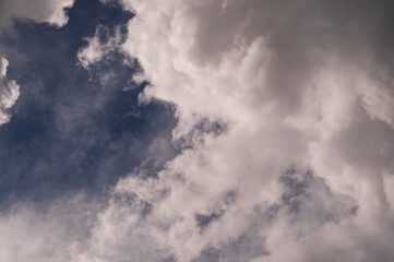 Fototapeta na wymiar blue background sky and atmospheric white clouds