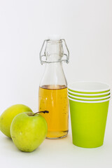 apple juice and apple on white background