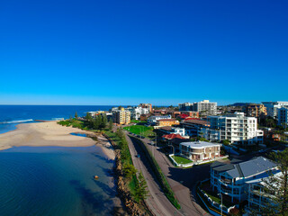 Fototapeta na wymiar Drone Aerial view of The Entrance NSW Australia blue bay waters great beach and sandy bars