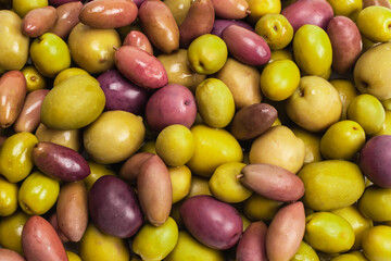Tasty mix olives background.