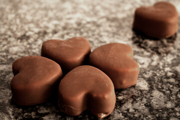 Ice cream bonbons with a heart shape and a solitary one