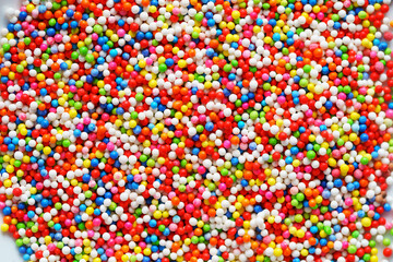 Fototapeta na wymiar close up of colorful sparkling sugar background