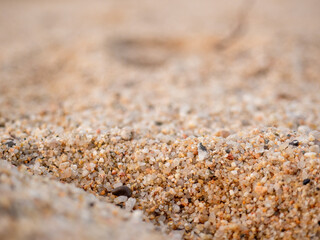 warm brown sand of a beach close up