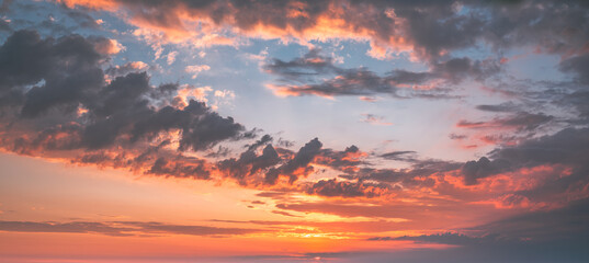 Sunset Sunrise Sky Background. Bright Dramatic Sky In Yellow, Orange And Blue Colors.