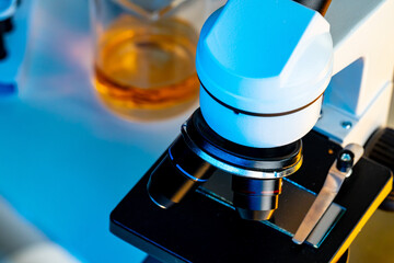 Microscope lenses on a laboratory desk close up