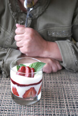 dessert of mascarpone cheese, strawberries, raspberries, tangerines, cookies and walnuts.