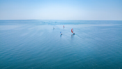 Aerial view of sailing yachts regatta competition.