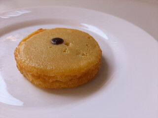 Kue Lumpur or Mud Cake. Traditional cake in Indonesia. Made from potato, flour, coconut milk and egg. Isolated in white background.