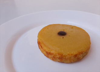 Kue Lumpur or Mud Cake. Traditional cake in Indonesia. Made from potato, flour, coconut milk and egg. Isolated in white background.