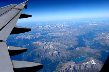 View from the passenger window overflying mountains