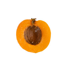 Closeup of One orange ripe cut apricot, macro of half of fresh fruit with brown pit isolated on a...