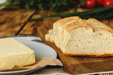 Fresh baked loaf of bread with butter bar