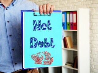 Business concept meaning Net Debt with phrase on the sheet.