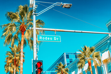 Rodeo Drive Road Sign on fashionable street Rodeo Drive in Hollywood.