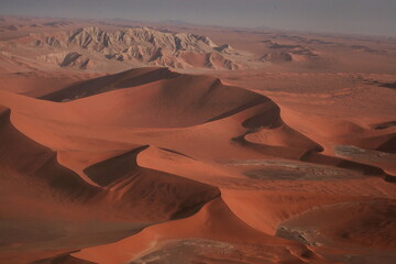 Naklejka na ściany i meble Namibia, flight on the Namib desert,