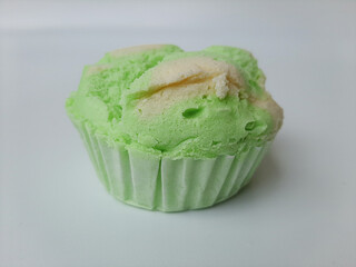 Steamed Sponge Cake, or Bolu Kukus in Indonesia. Isolated in white background. Side view.