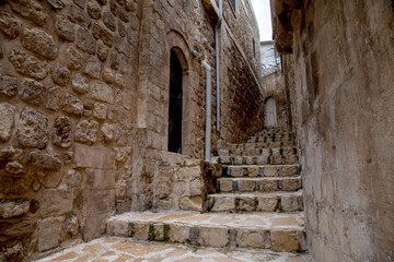 View of the narrow streets of the historic Mardin. Mardin, Turkey.