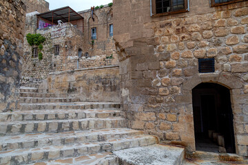 View of the narrow streets of the historic Mardin. Mardin, Turkey.