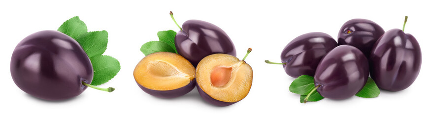 fresh purple plum and slices with leaves isolated on white background with clipping path and full depth of field. Set or collection