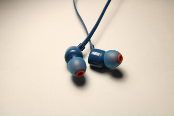 Blue and orange earphone