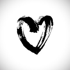 Нand drawn black heart silhouette with grunge brush and pencil (chalk or charcoal) texture. Vector illustration made by tracing. White background.