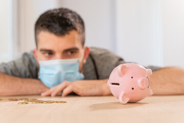 Coronavirus. Depressed and worried business man because impact on retail businesses shut down...