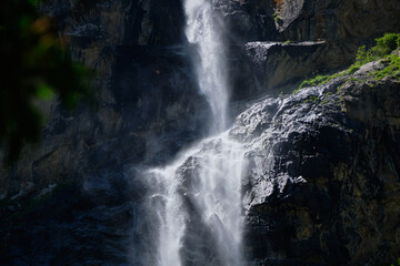 high in the mountains waterfall on the rocks