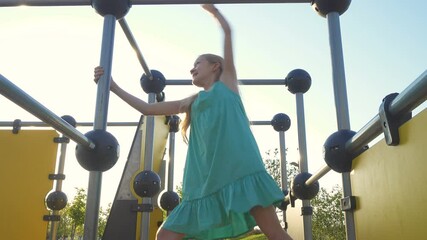 girl on a monkey bars