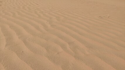 Beautiful dust waves in desert field